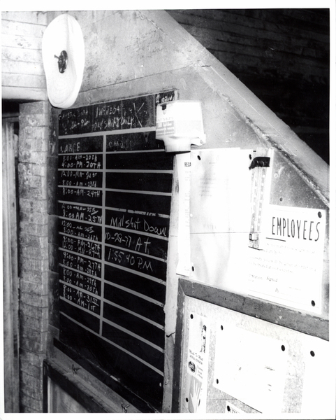 Chalkboard of date and time of the mill shutdown