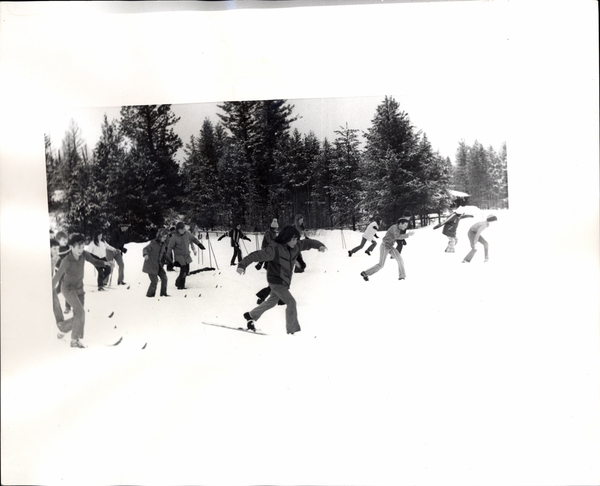 Children doing ski school excercises