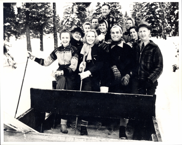 Skiers in sled, left are Ida Brown L 2nd row, Carl Brown R first row, “Crusty” Hamon next to C. Brown