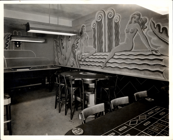 Gaming room in the Yacht Club, in view mural, tables, and stools