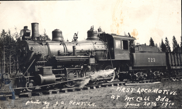 Original postcard of the first locomotive in McCall, Idaho. Image contains the text: "X 723 CAMERON SUMMIT LINE 723 photo by J.A. HENTILA FIRST LOCOMOTIVE AT McCAH SDA June 20th 1914"