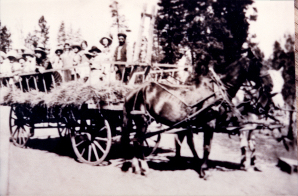 Mule team and wagon: “Louis Heacock with camp bunch, McCall.