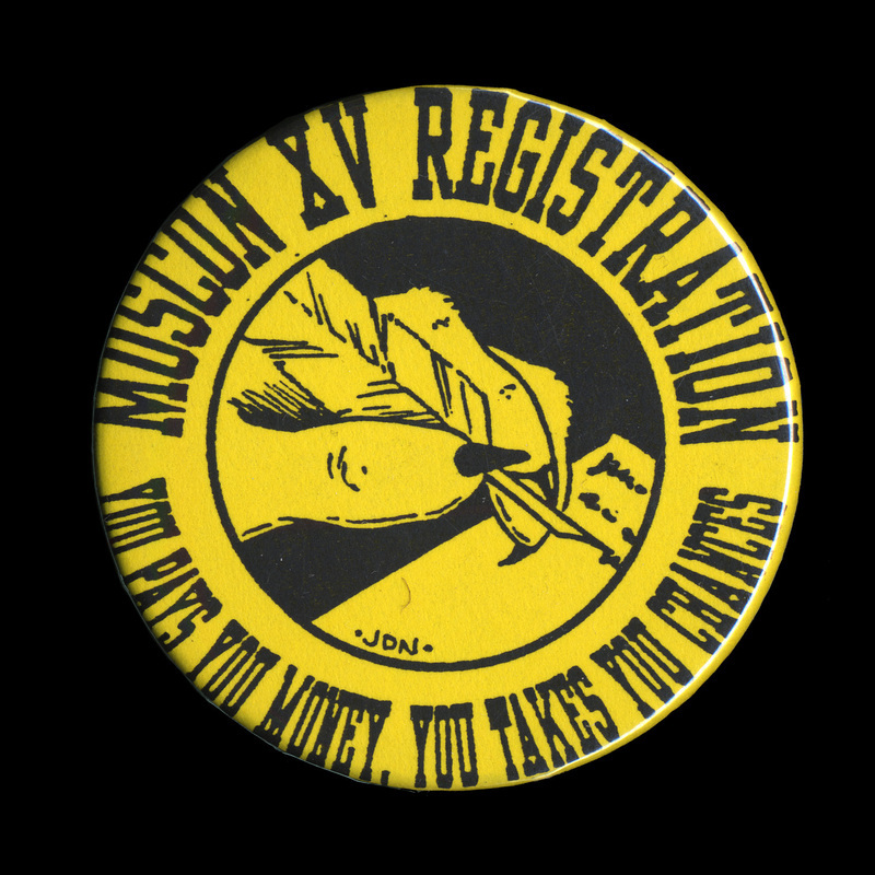 A yellow, circular button with an illustration of a creature's hand writing with a fountain pen, surrounded by text that reads "Moscon XV Registration / You pays you money, you takes you chances." The quote is possibly referring to the a passage from Aldous Huxley's forward to the 1946 edition of A Brave New World, titled "A Mock Exam": "...or else one supranational totalitarianism, called into existence by the social chaos resulting from rapid technological progress in general and the atomic revolution in particular, and developing, under the need for efficiency and stability, into the welfare-tyranny of Utopia. You pays your money and you takes your choice."