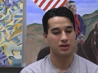 Abraham "Abe" Yearout discusses the importance of the horse, basketball and the American Flag in his paintings
