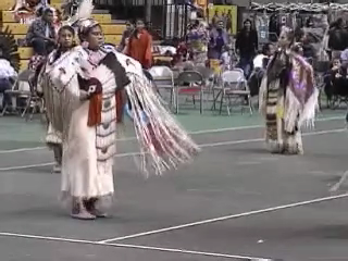 Redtail Singers at the Tutxinmepu Powwow on the University of Idaho campus, October 2001, with Women's Traditional Dancers