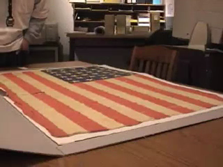 Mylie Lawyer, tribal elder, talks about the flag given by Governor Stevens to Lawyer at the Treaty of 1855 and later used in James Lawyer's camp during the Conflict of 1877