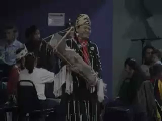 Honoring the Youngest tribal member, Isaac Redheart SiJohn, with mother, Leanne SiJohn, during the Lake Celebration Powwow