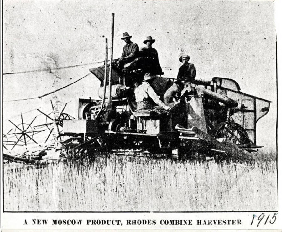 Rhodes Combine Harvester was first manufactured at Moscow (410 South Main Street) then Colfax and about 1917 moved to Dishman, Washington, and went out of production about 1924. Wording on photo: 'A new Moscow product, Rhodes Combine Harvester' Handwritten on photo: 1915