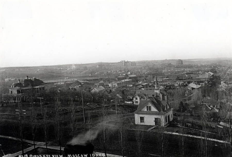 Aerial photograph looking southwest from the Courthouse from a postcard dated 1916. House in foreground at Adams and Sixth streets was the Art Ransom residence. He was the first agent for the Oregon Railroad and Navigation Company railroad when it arrived in 1885. Later owned the Pastime on north Main Street.