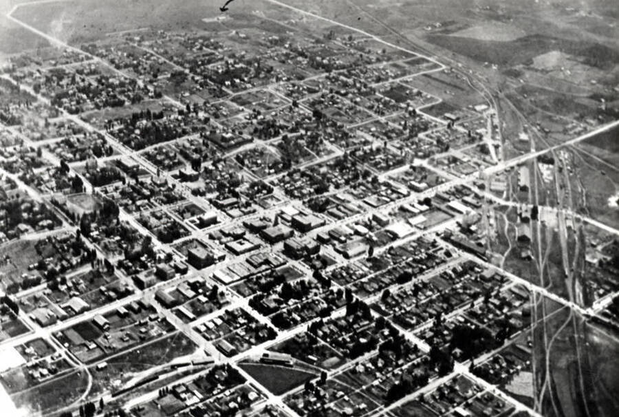 Looking at the southeast part of Moscow about 1919. Arrow at top of picture points to the Frank White farm and buildings. Area is now East Gate Addition of Moscow.