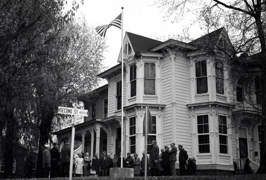 McConnell Mansion. Group in front at dedication of flag pole donated by the American Legion, Veterans of Foreign Wars, and World War One veterans. Picture November 11, 1974 by Clifford M. Ott.
