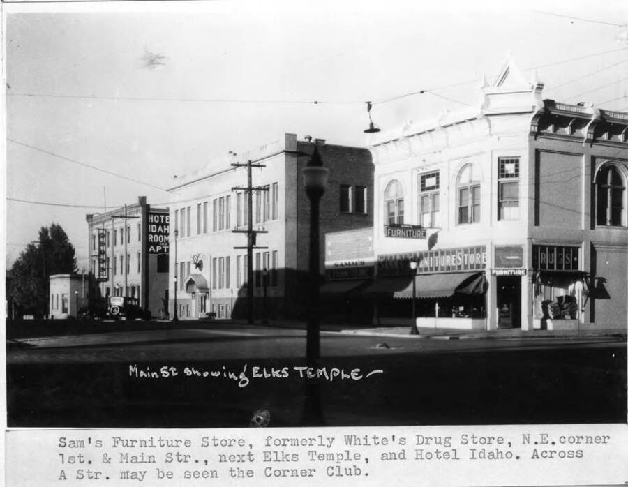 Formerly White's Drug Store, northeast corner of First and Main streets; next Elks Temple and Hotel Idaho. Across A Street may be seen the Corner Club.