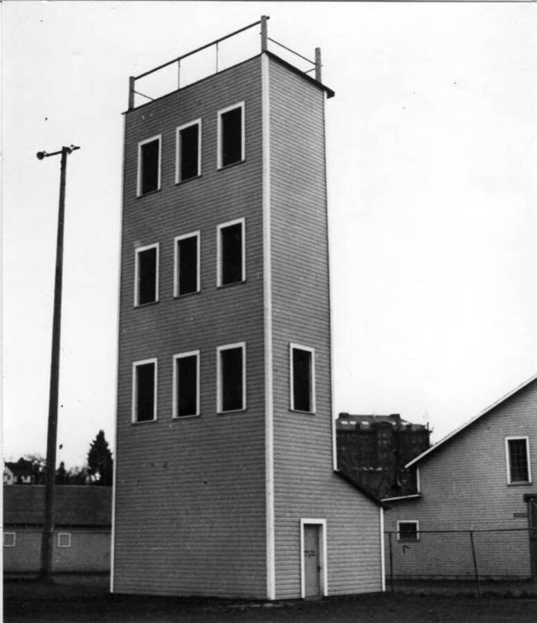 Moscow Fire Department practice tower, located in the Latah County Fair Grounds. Looking southwest. Picture from Idahonian in the 1940s.