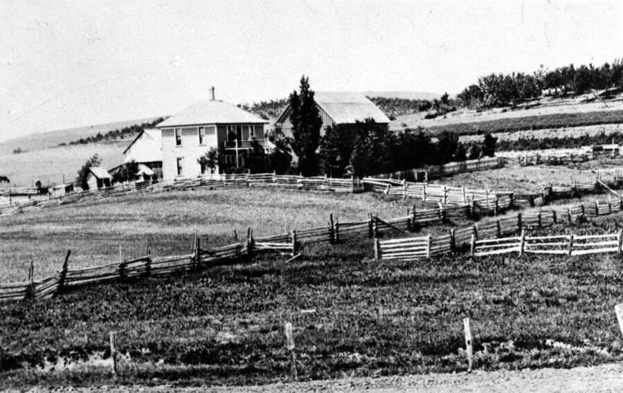 T.A. Estes farm east of Estes Station named after Estes, a pioneer of this area. Same house is still standing as of 1976. The picture taken in the early 1900s.