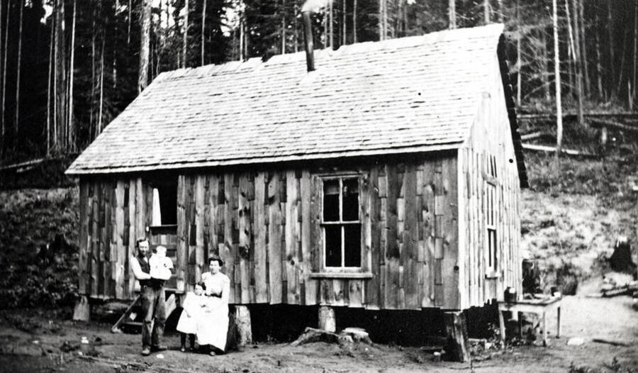 Sawyer home on their homestead near Troy in 1905. Left  to right: Earl (father), Clyde, Helen, and Lula (mother). Philip B. of Potlatch was not yet born. Picture from Philip.