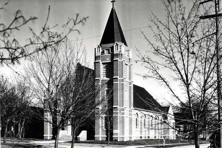 Holy Trinity Roman Catholic Church at the northeast corner of First and Polk streets built in 1930. Picture taken by Charles Dimond of Hodgins Drug Store.