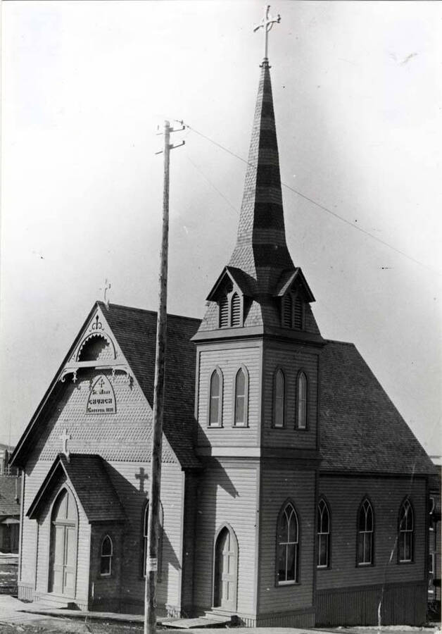 First St. Mark's church organized in 1888 and built in 1892; was located at the southwest corner of First and Jefferson streets. Burned August 16, 1938.