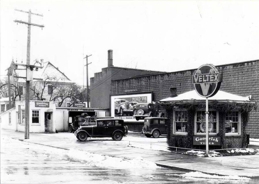 Southeast corner of Fifth and Main streets. February 12, 1935. Veltex service station. Zumhoff home at left, Kenworthy Theatre right.