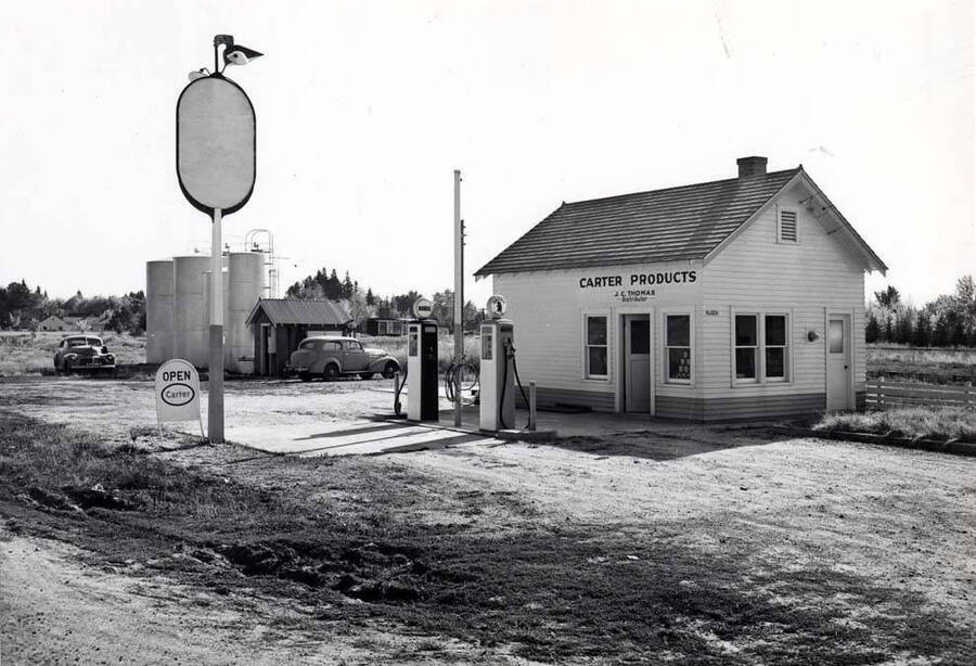 South side of the Moscow-Pullman Highway east of Line Street. Carter Products service station and bulk tanks beyond. J.C. Thomas distributor October 4, 1945.