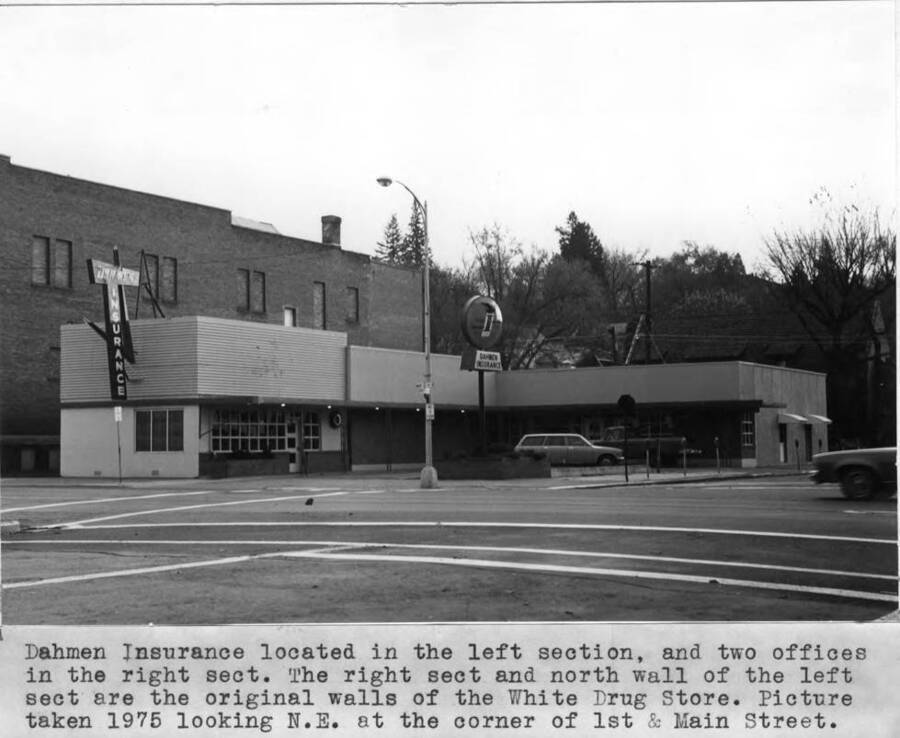 Located in the left section, and two offices in the right section. Right section and north wall of the left section are the original walls of the White Drug Store. Picture taken 1975 looking northeast at corner of First and Main streets.