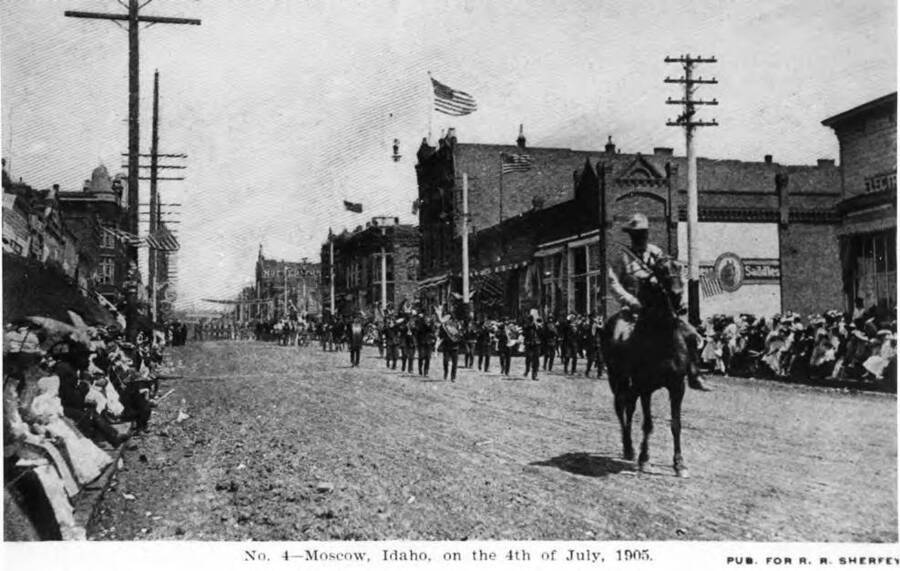 No. 4, Moscow, Idaho, on the Fourth of July, 1905. Looking north from south of Fifth Street, Merton Waterman. R.R. Sherfey.