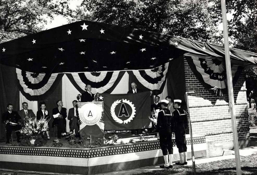 Herman N. Wilson, manager of the Washburn-Wilson Seed Company, making the acceptance speech. Ceremony was in East City Park, [Moscow, Idaho] September 6, 1944.