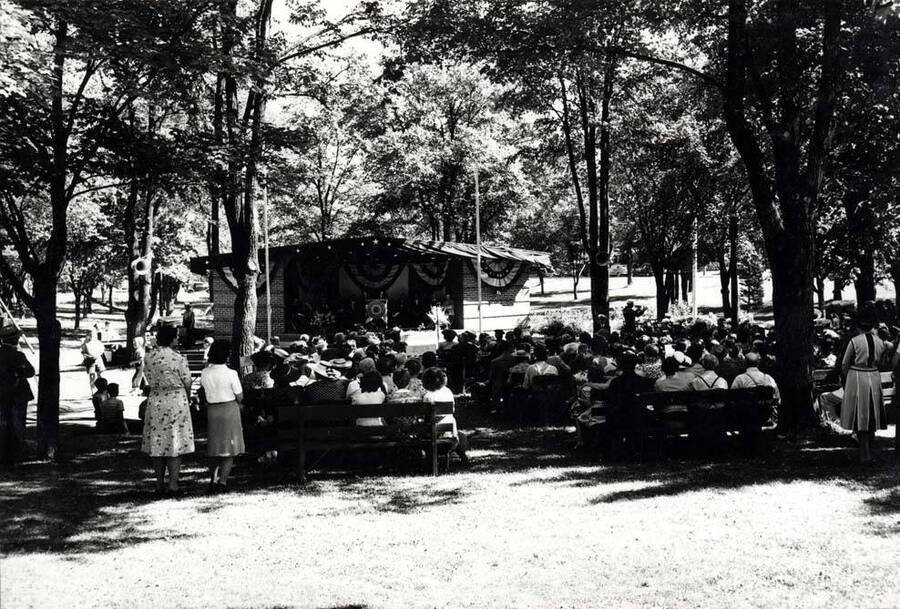 Crowd with the speakers platform beyond in Moscow's East City Park at the presentation of the Achievement award (Food for Freedom) September 6, 1944.