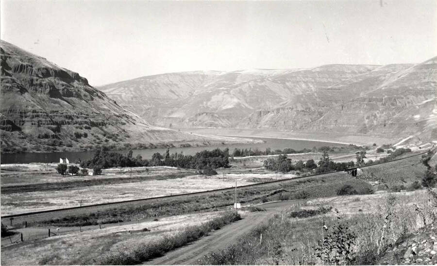 White walls still standing at left were the location of the Wawawai store and post office. Orchards occupied the bare grounds and to the left. Railroad moved higher. December 20, 1972.