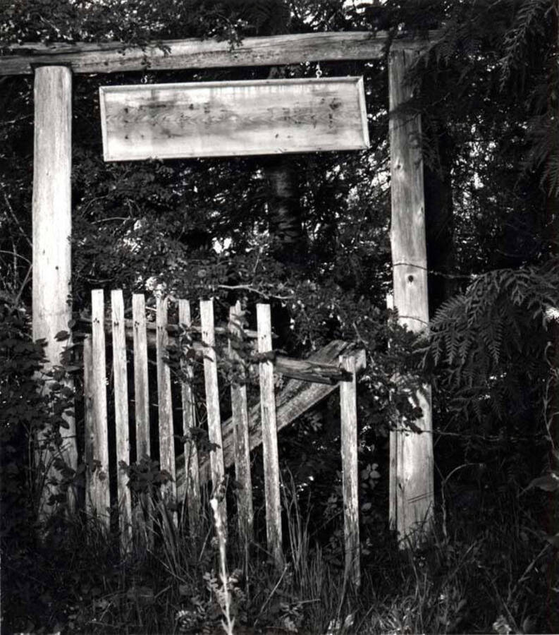 Entrance to the log cabin below [90-10-086] built of sawed and sized logs.