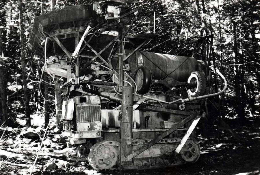 Frank Milbert of Kennedy Ford is the owner of the Gold Creek area where the following pictures were taken in 1976 by Clifford M. Ott. He [Milbert] is the builder and owner of the above [90-10-091] machine for salvaging gold.