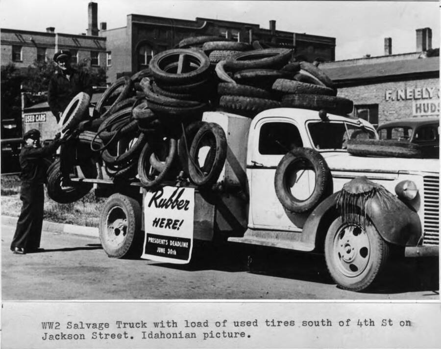 World War II salvage truck with load of used tires south of Fourth Street on Jackson Street. Idahonian picture.