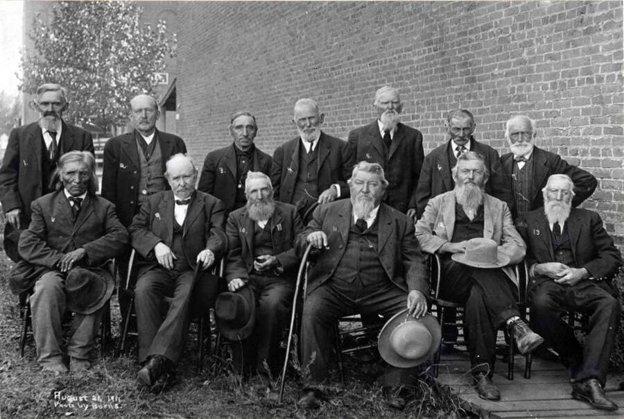 Left to right, back row: Barthold Schlader, George Meister, Henry Sturm, John Bauer, Jacob Kambitch [Kambitsch?] Joseph Semler, George Haidacher. Left to right, front row: Squally John, Patrick Drain, Harold C.G. Sodorff, Michael Schultheis, Sr., John P. Klein, James Hall. August 21, 1911.