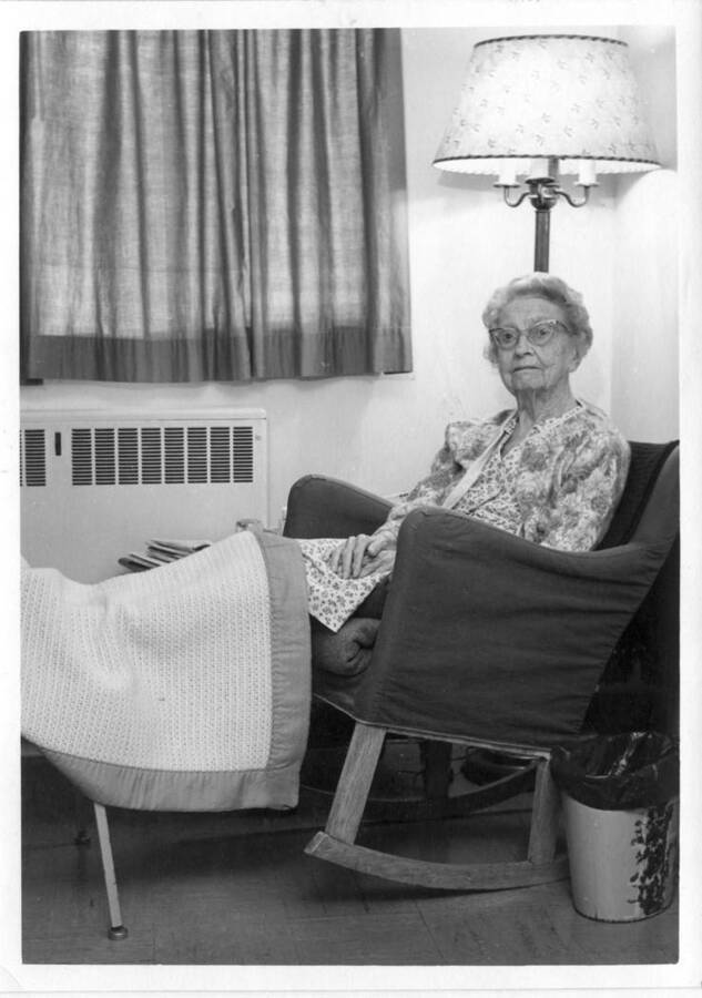 Lily [Lillie] Lieuallen Woodworth, daughter of Almon Asbury Lieuallen, born in Latah County in 1874, who has continuously been a resident of Moscow and now lives at the Latah County Nursing Home. Picture taken January 24, 1969, by Clifford M. Ott.