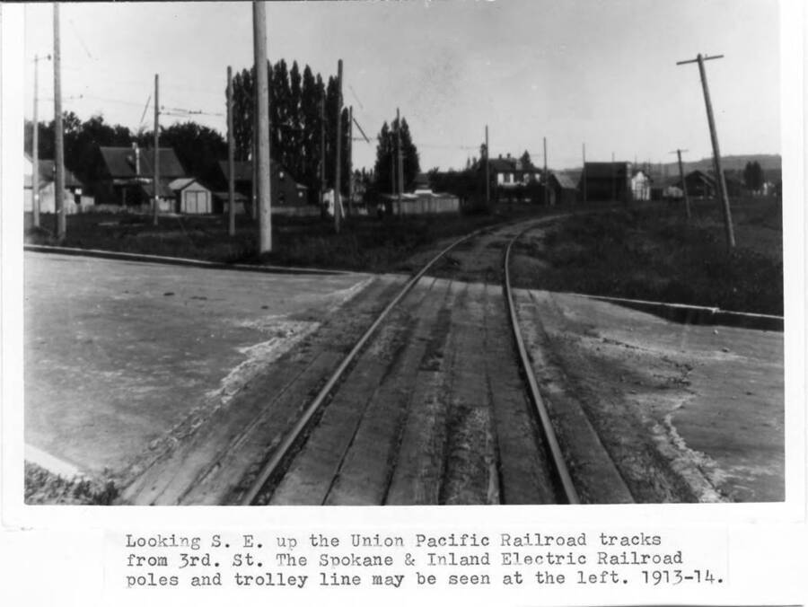 Spokane & Inland Electric Railroad poles and trolley line may be seen at the left. 1913-14.