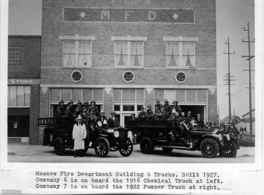 Built 1927. Company 6 is on board the 1916 chemical truck at left. Company 7 is on board the 1922 pumper truck at right.