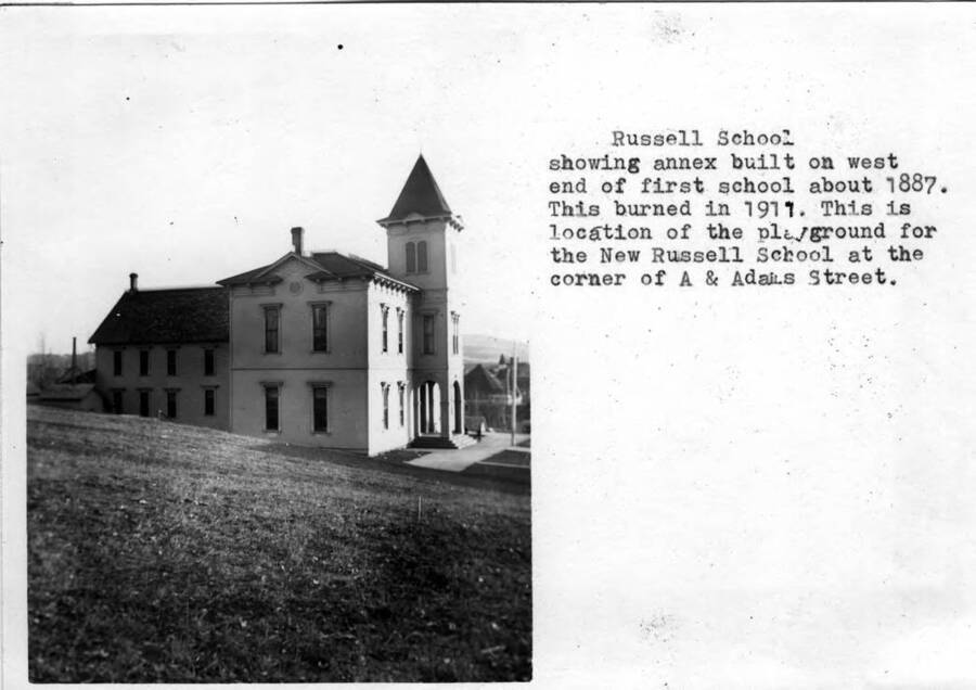 Russell School showing annex built on west end of first school about 1887. This burned in 1911. This is location of the playground for the new Russell School at the corner of A and Adams streets.