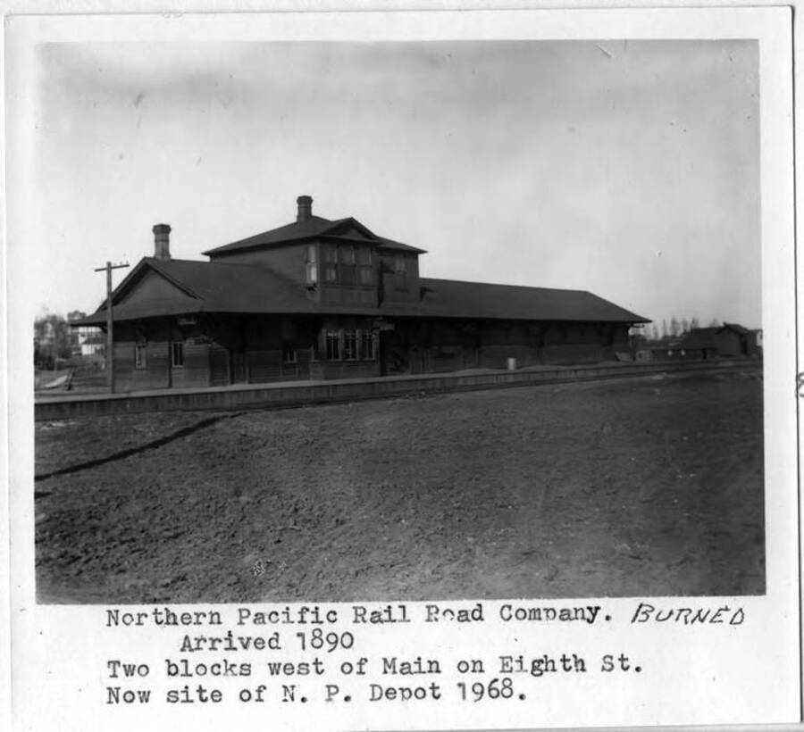 Arrived 1890. Two blocks west of Main on Eighth Street. Now site of Northern Pacific depot 1968. Burned.