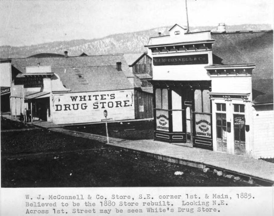 Believed to be the 1880 store rebuilt. Looking northeast across First Street may be seen White's Drug Store.