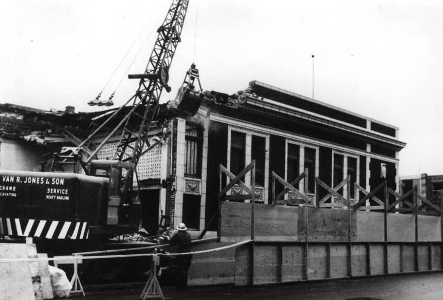 Picture from the Idahonian showing the demolition of the First Trust and Savings Bank at the corner of Third and Main Streets in Moscow, Idaho.