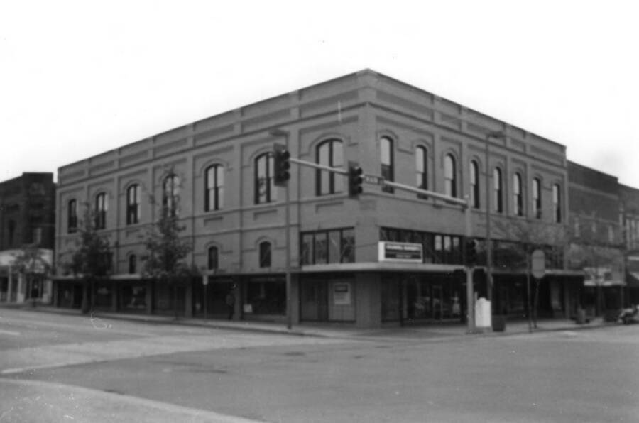 The Davids' building was next owned by Len Bielenberg and W.E. Anderson, Moscow attorneys who sold to Mostafa El Burai in 1987. He restored the building to its original brick exterior in 1988 and named [it] El Burai Center. The building is now for sale. Picture taken by Clifford M. Ott May 21, 1989.