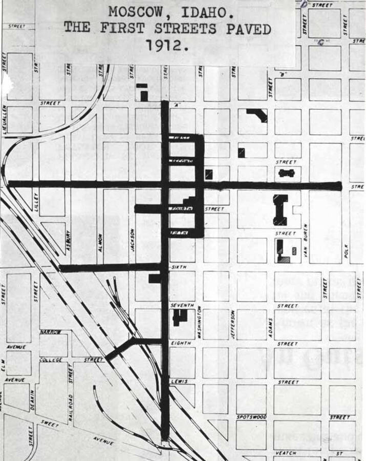 Photocopy of map with first streets paved darkened.