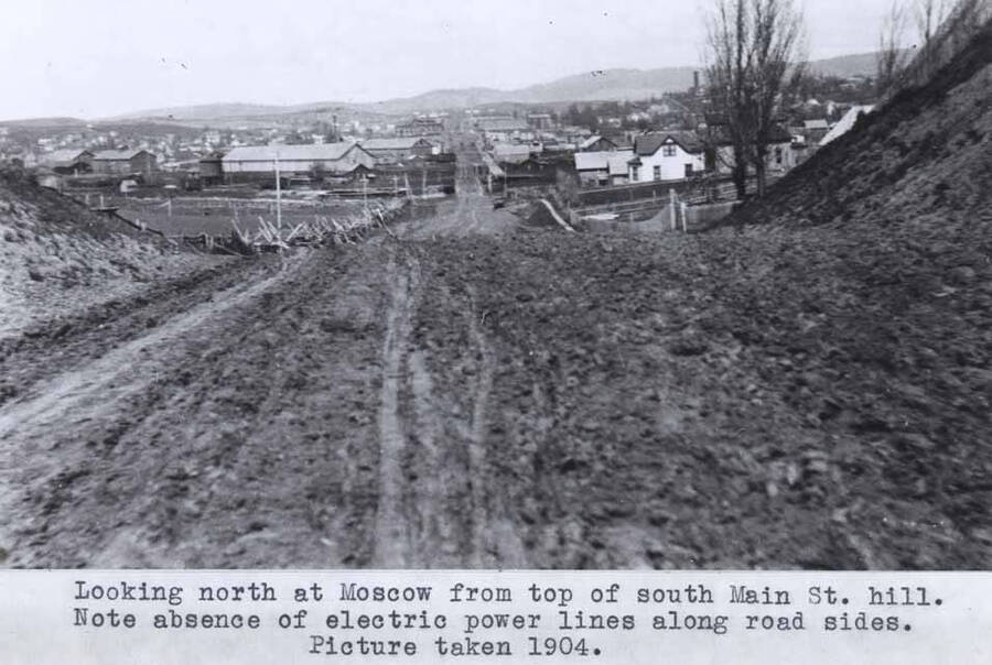 From top of south Main Street hill. Note absence of electric power lines along road sides. Picture taken 1904.