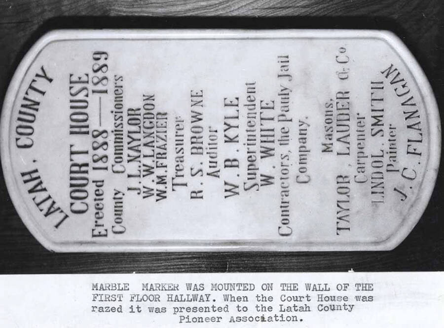 Was mounted on the wall of the first floor hallway [of Courthouse]. When the Courthouse was razed it [the plaque] was presented to the Latah County Pioneer Association.