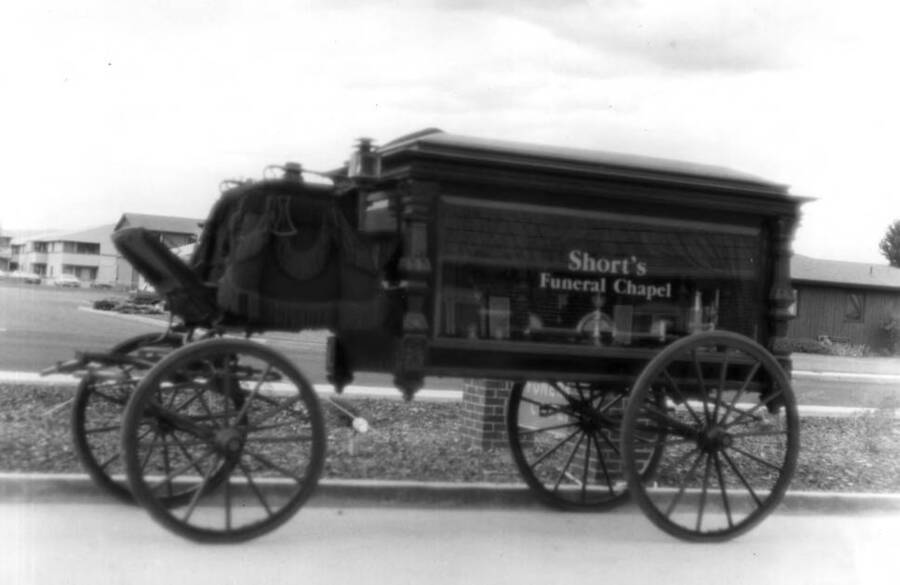 Pulled by two horses. Picture taken in front of Short's Funeral Chapel at 1225 East Sixth Street July 9 by Clifford M. Ott