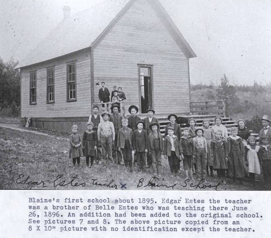 About 1895. Edgar Estes, the teacher, was a brother of Belle Estes who was teaching there, June 26, 1896. An addition had been added to the original school. See pictures [90-4-007 and 90-4-008]. The above picture [90-4-008a] copied from an 8 X 10' picture with no identification except the teacher.