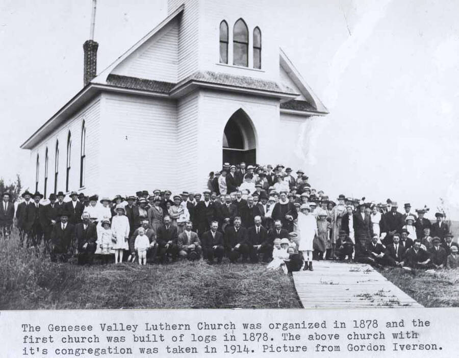 Was organized in 1878 and the first church was built of logs in 1878. The above church [90-4-023] with its congregation was taken in 1914. Picture from Gordon Iverson.