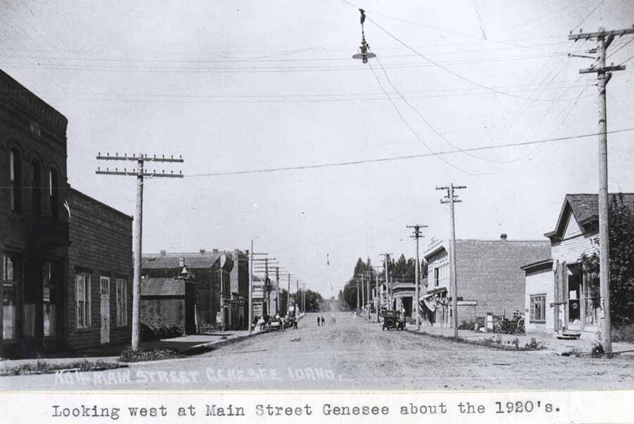 About the 1920s. Wording on photo: 'No. 4 Main Street Genesee, Idaho.'