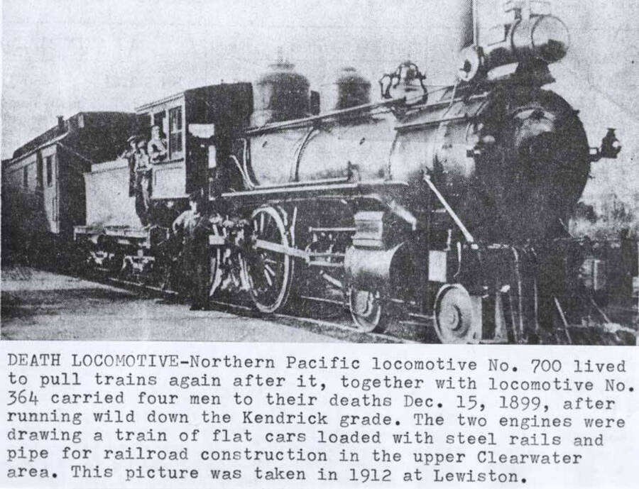 Caption from newspaper: "Death Locomotive." Northern Pacific locomotive N. 700 lived to pull trains again after it, together with locomotive 364 carried four men to their deaths Dec. 15, 1899 after running wild down the Kendrick grade.