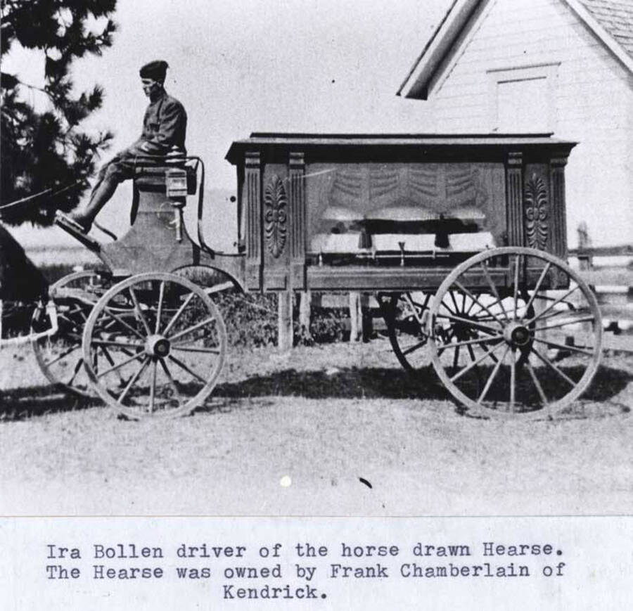 Ira Bollen, driver of the horse-drawn hearse. Hearse was owned by Frank Chamberlain of Kendrick.
