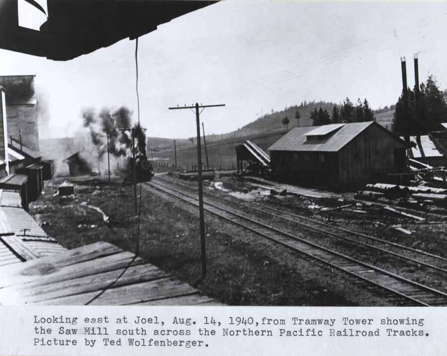 August 14, 1940, from tramway tower showing the sawmill south across the Northern Pacific Railroad tracks. Picture by Ted Wolfenberger.
